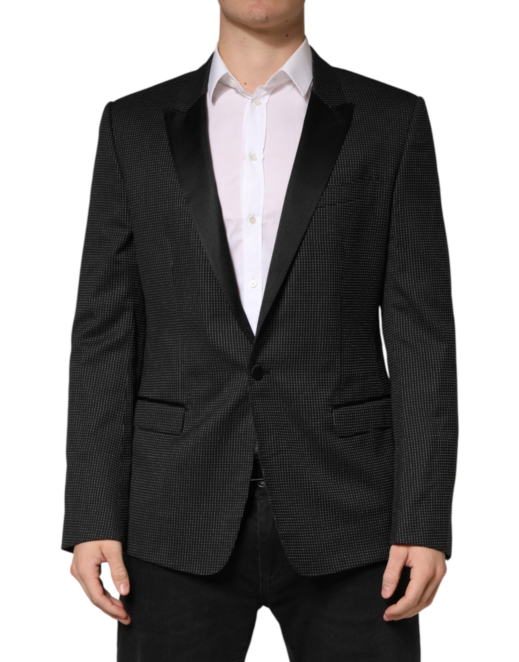 Discover the Dolce & Gabbana Black Fantasy Single Breasted Jacket Blazer, where exquisite craftsmanship meets luxurious materials, perfect for elevating any sophisticated wardrobe.