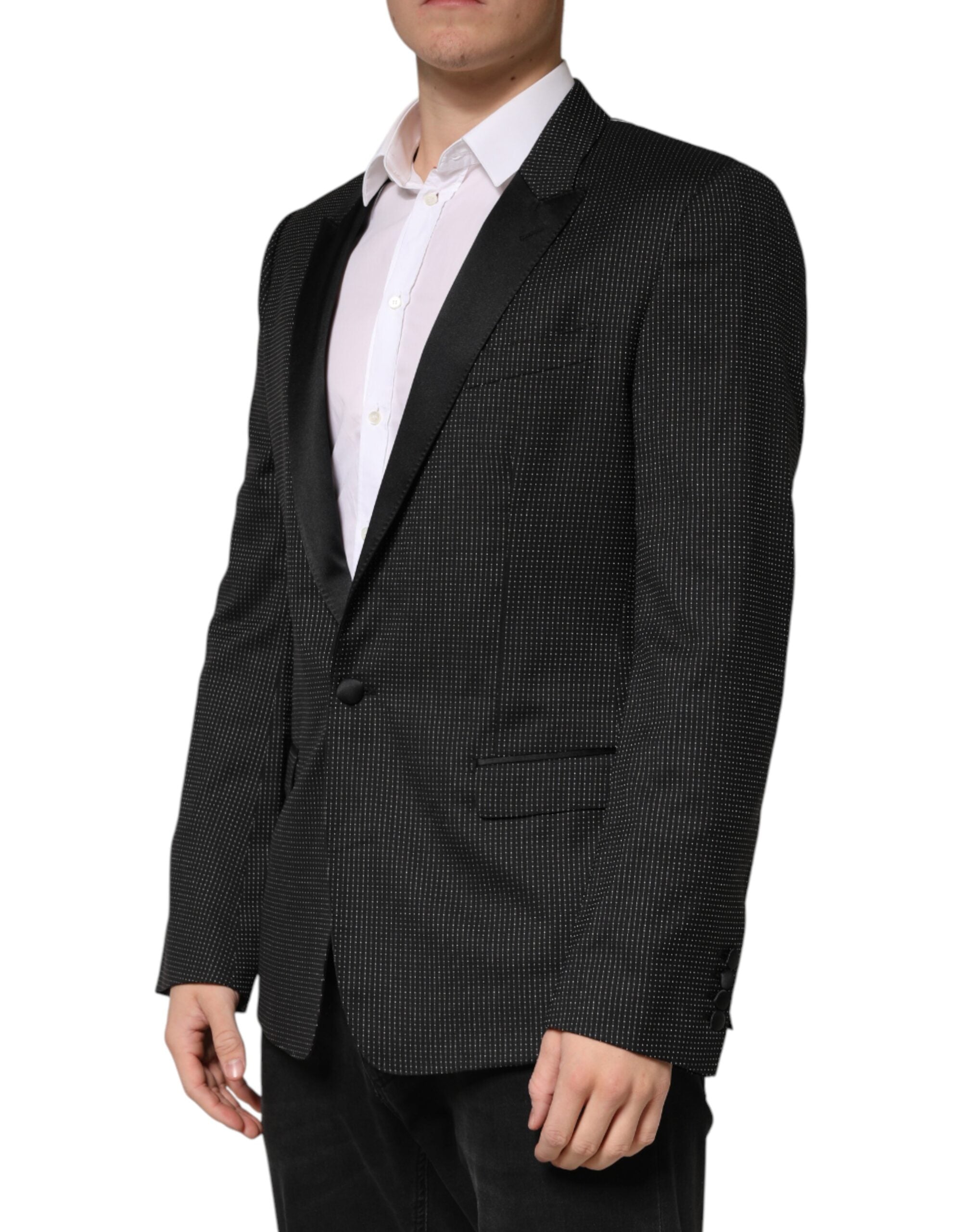 Discover the Dolce & Gabbana Black Fantasy Single Breasted Jacket Blazer, a symbol of exquisite Italian craftsmanship and luxurious materials, perfect for the discerning individual.