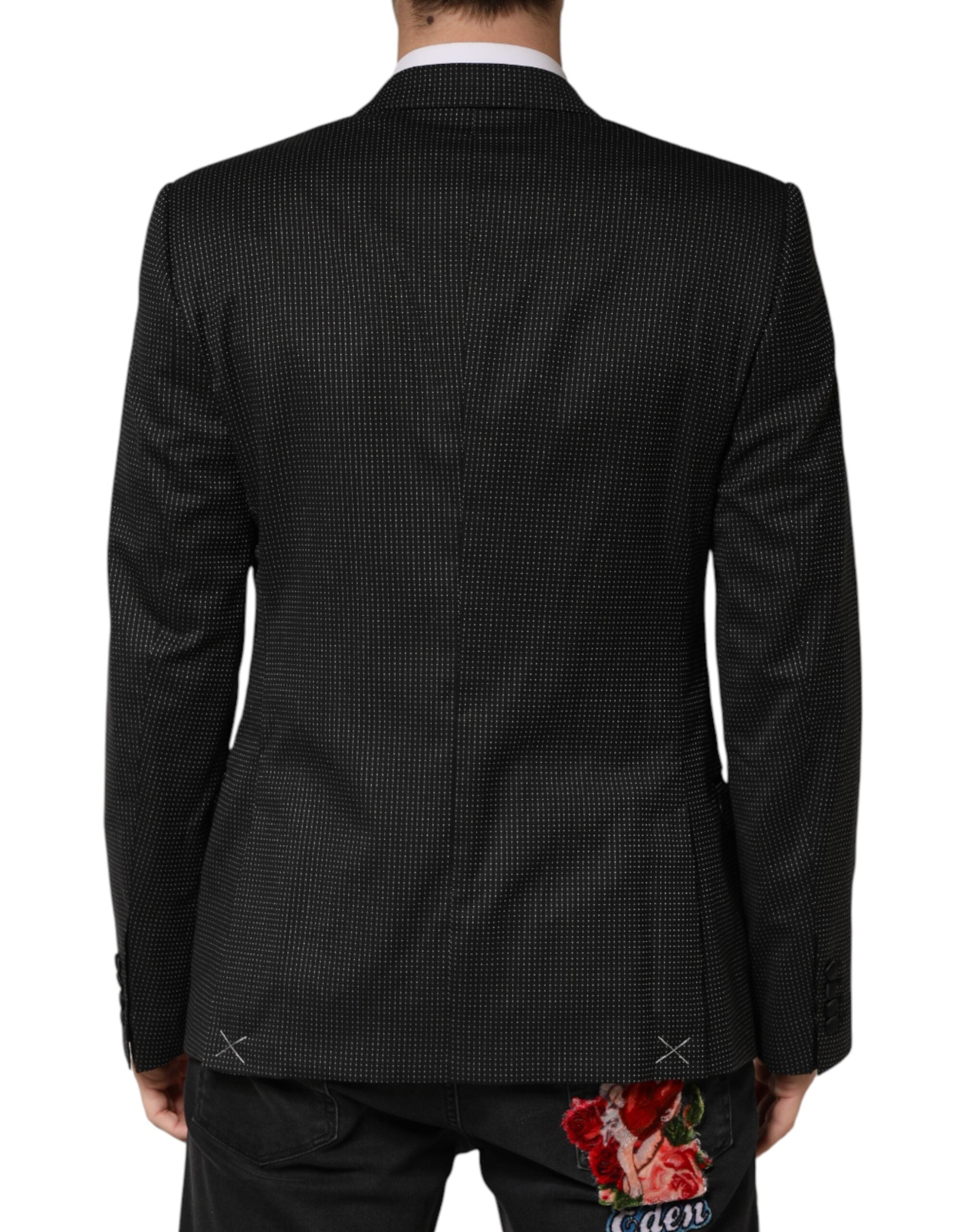 Discover the Dolce & Gabbana Black Fantasy Single Breasted Jacket Blazer, a testament to Italian craftsmanship, blending luxurious materials for timeless elegance.