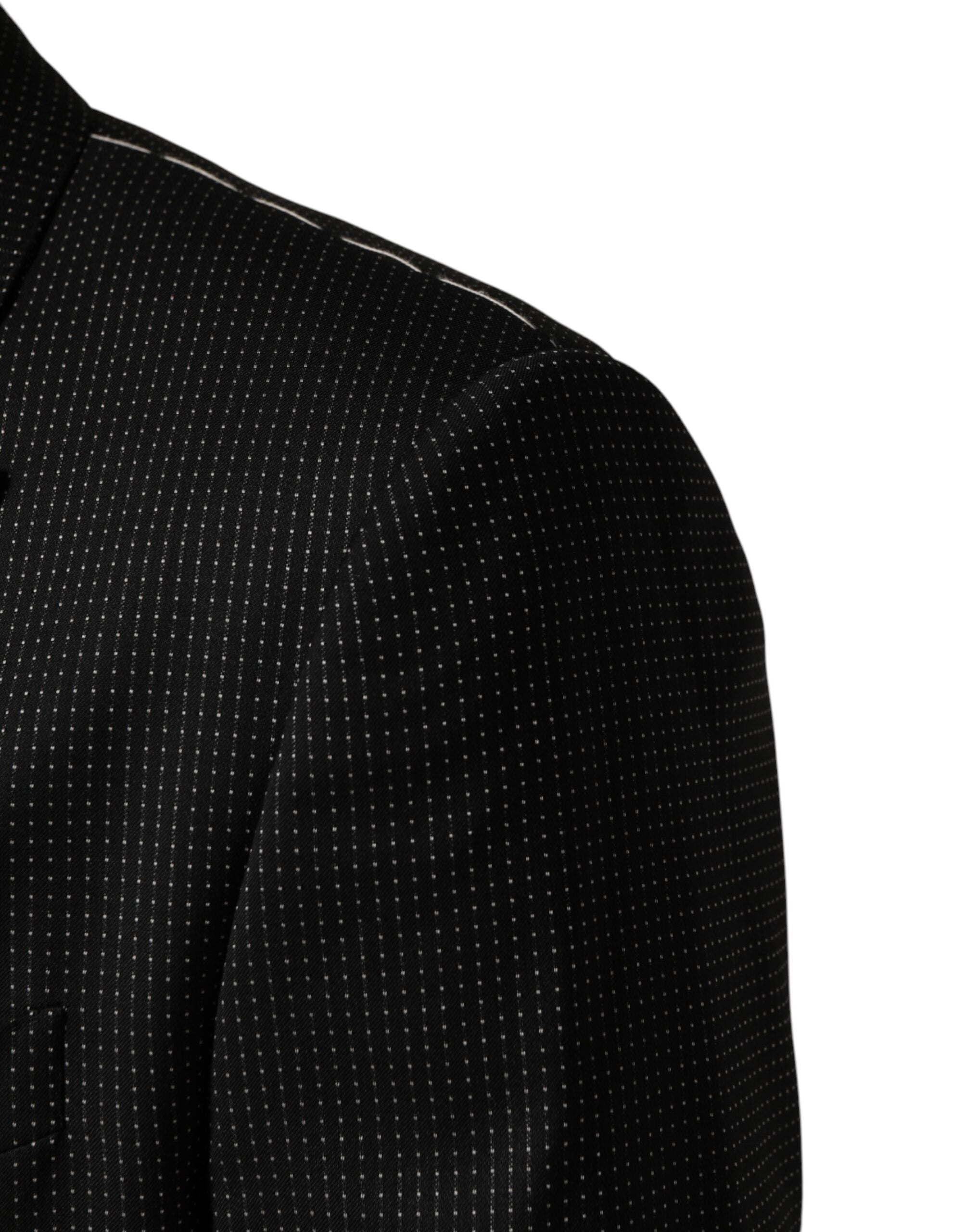 Discover the Dolce & Gabbana Black Fantasy Single Breasted Jacket Blazer, an embodiment of artisanal luxury, crafted from exquisite materials for timeless elegance.