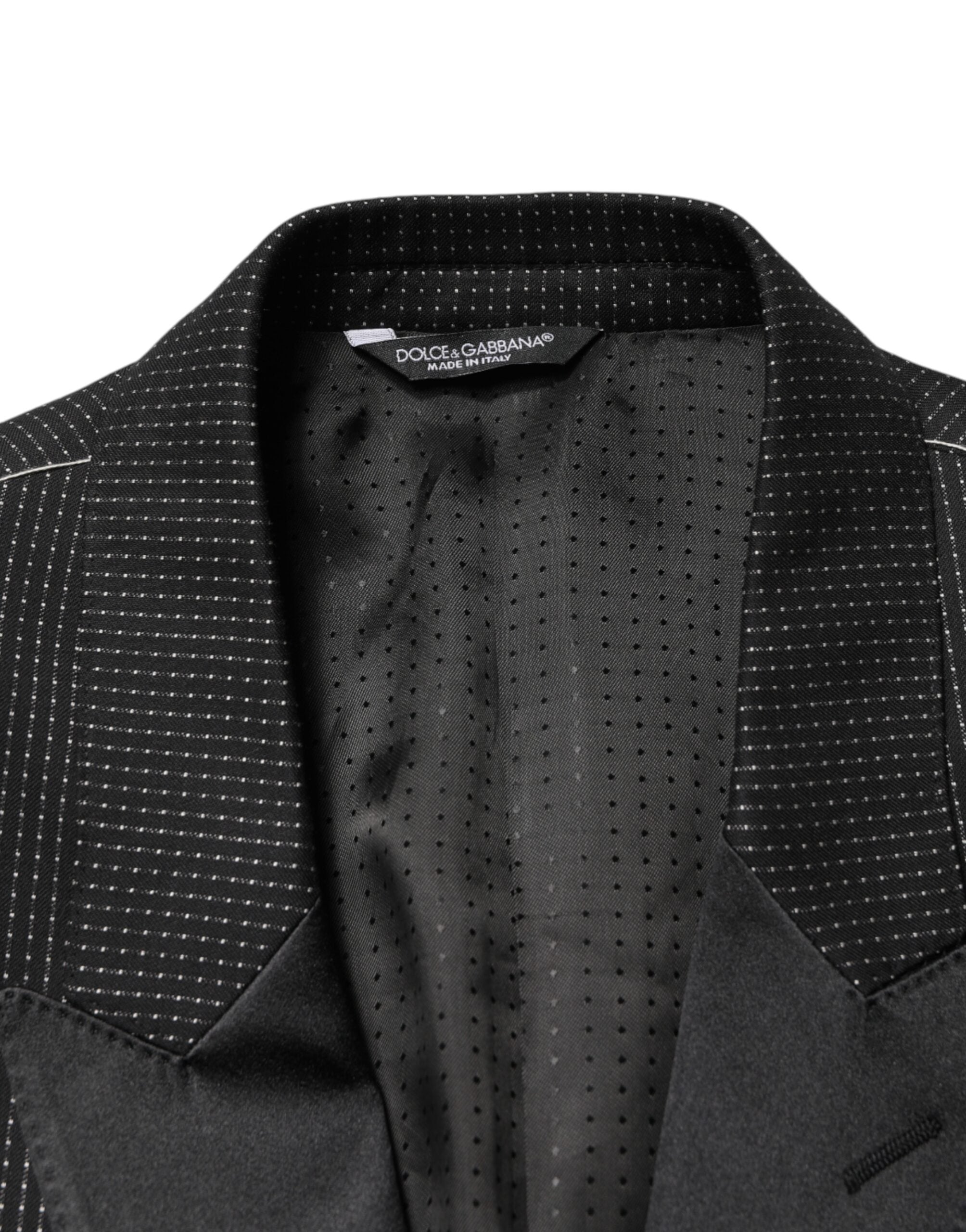 Experience the allure of the Dolce & Gabbana Black Fantasy Single Breasted Jacket Blazer, crafted from luxurious materials, embodying timeless elegance and sophistication.