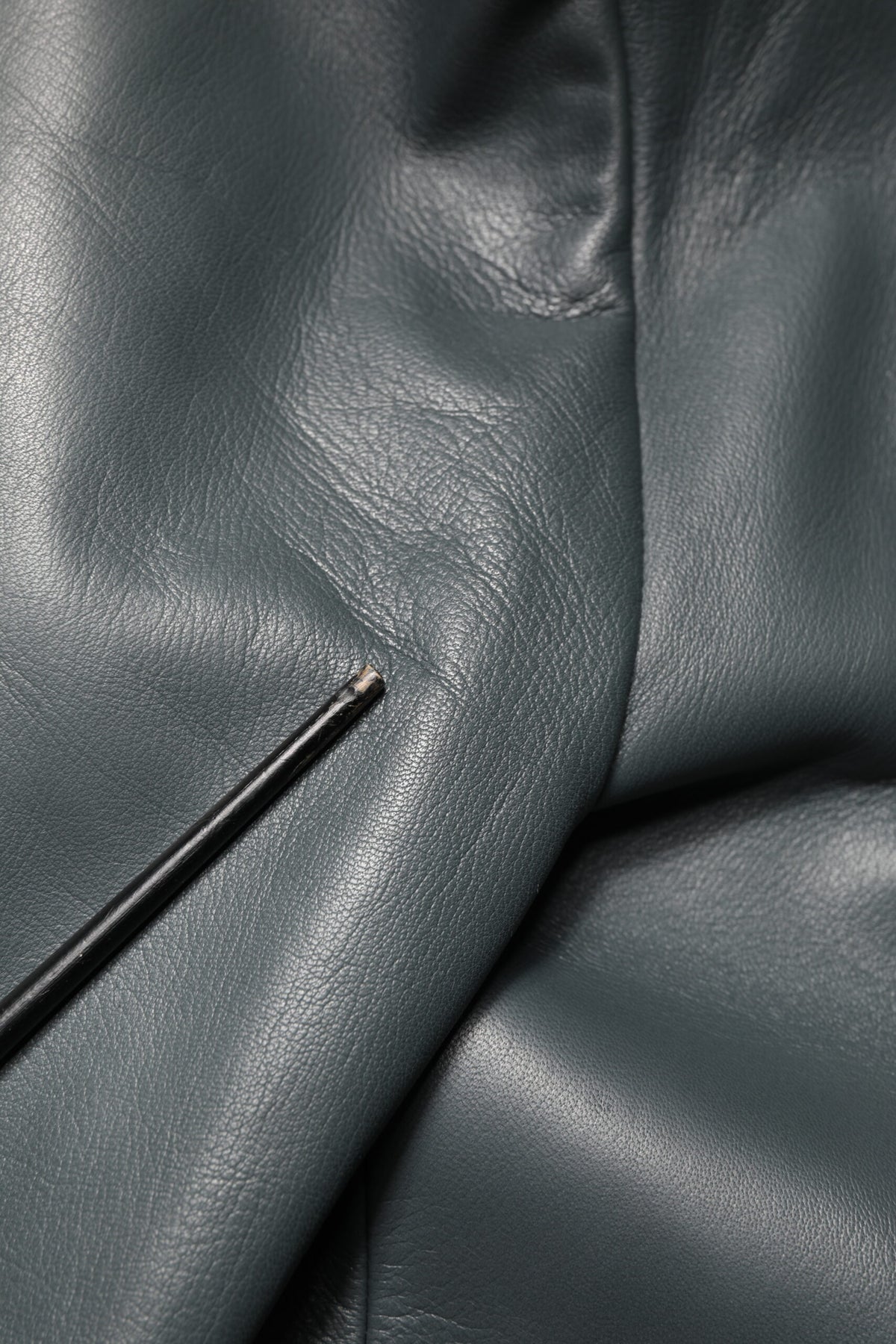 Elevate your wardrobe with the Dolce & Gabbana Black Leather Double Breasted Blazer, a testament to Italian craftsmanship and timeless elegance, perfect for any sophisticated occasion.